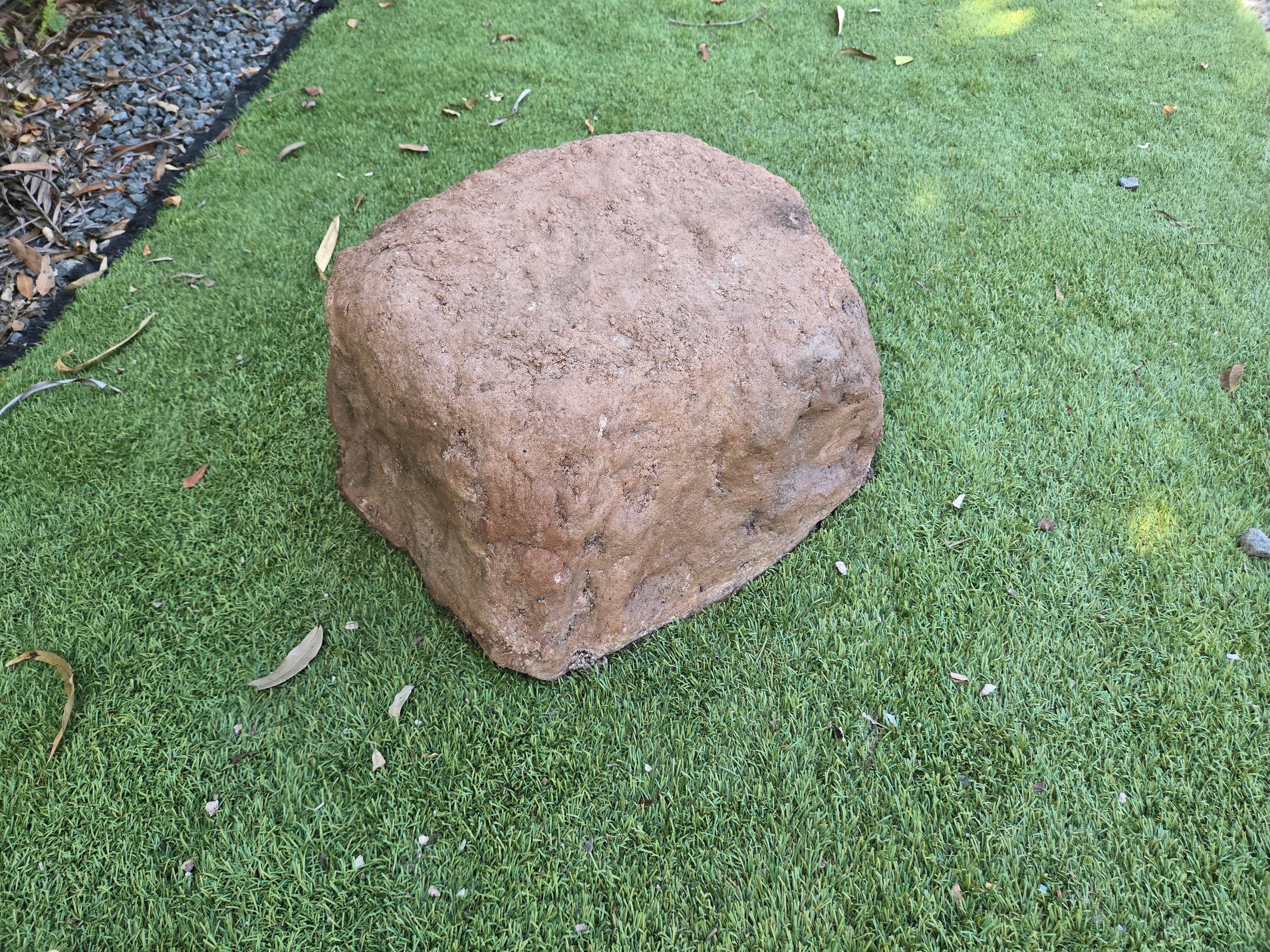 urn for ashes in a shape of a rock