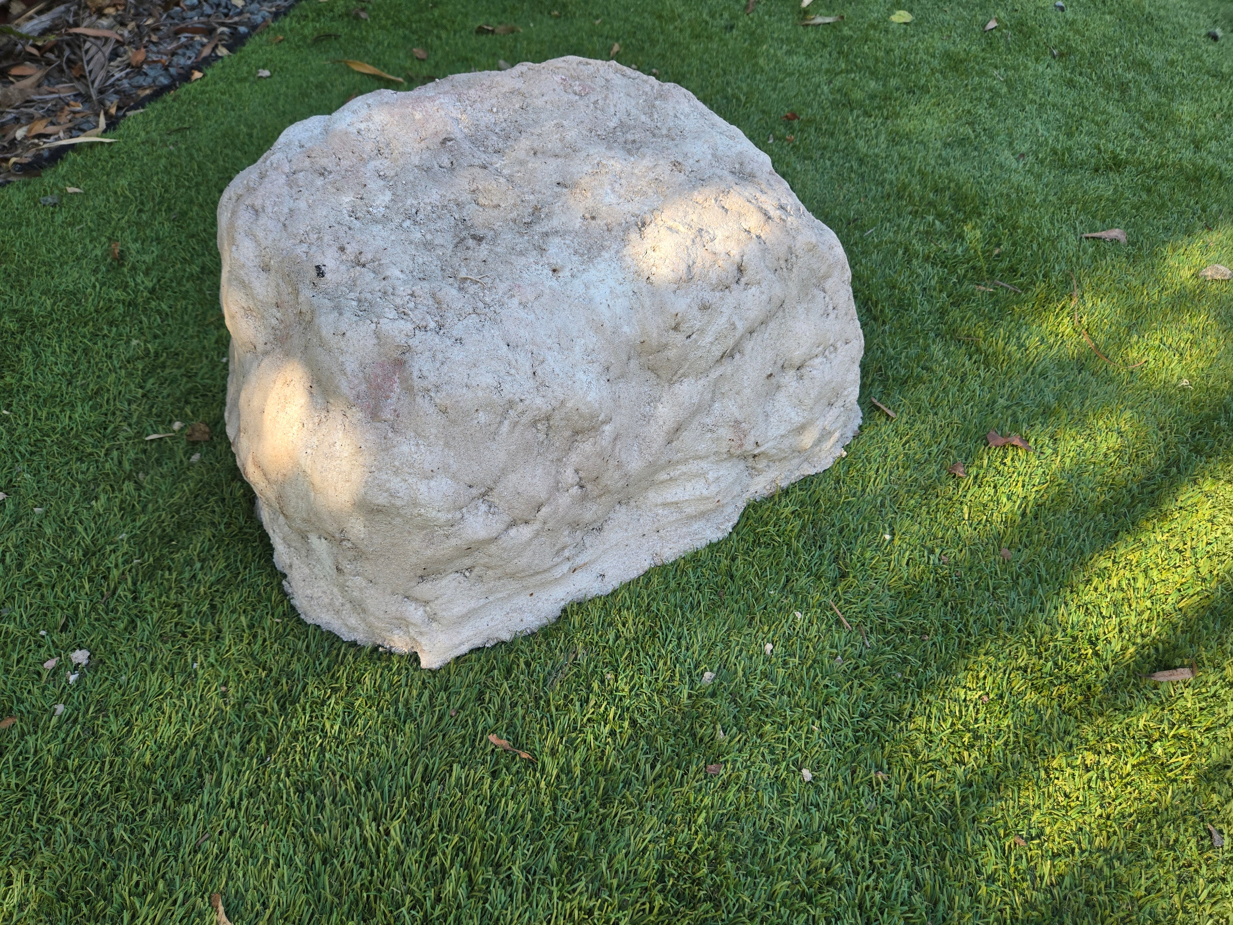 urn for ashes in a shape of a rock