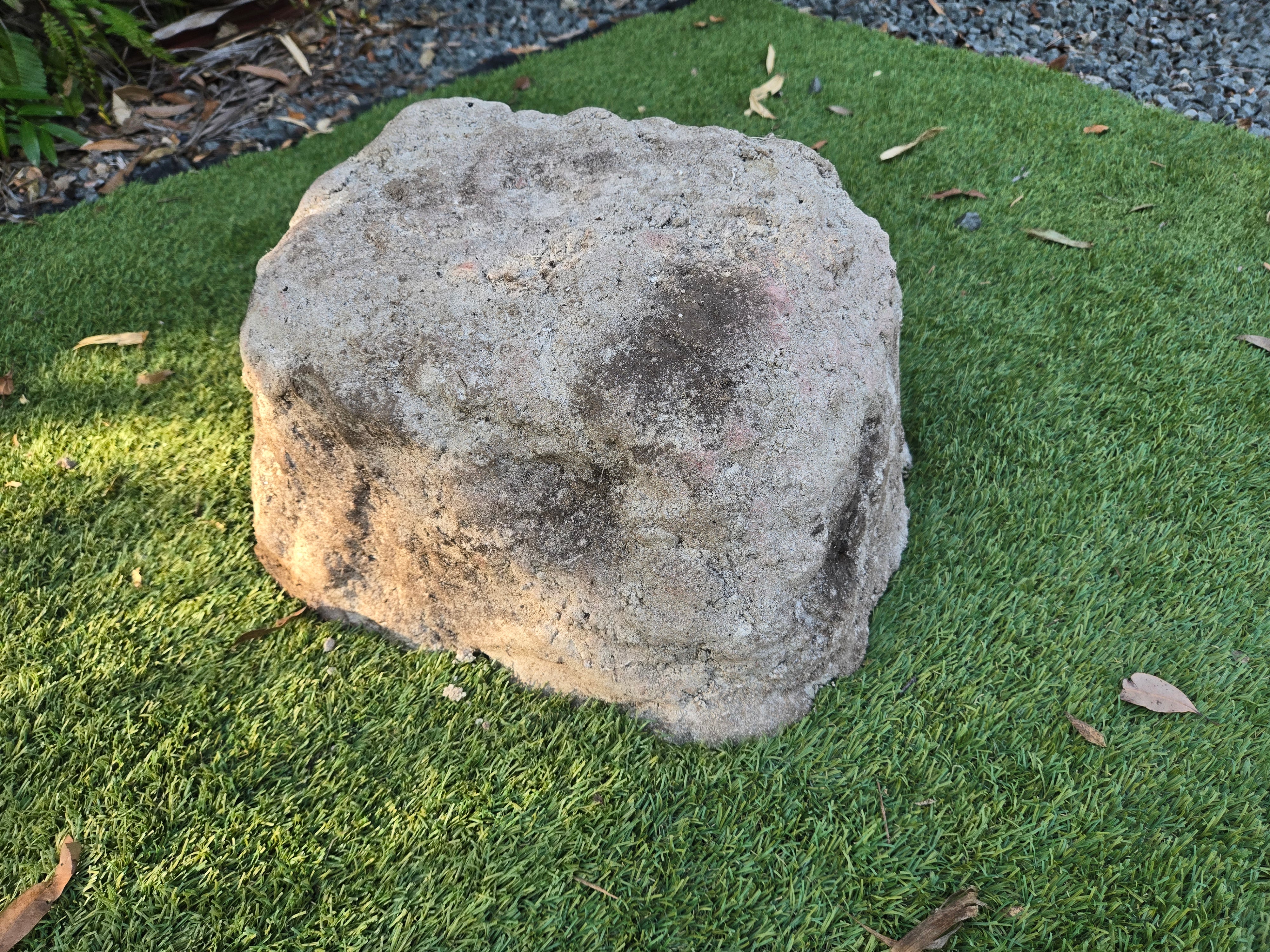 urn for ashes in a shape of a rock