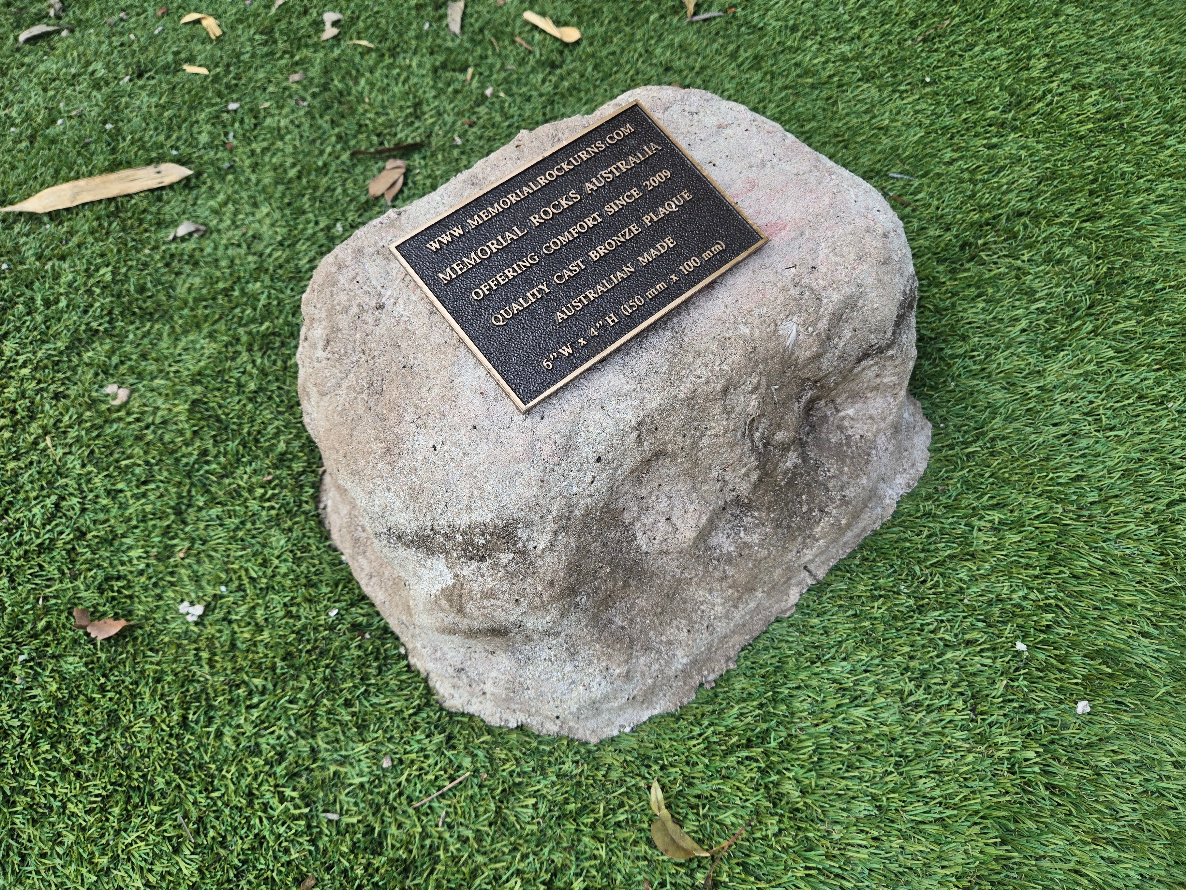 urn for ashes in a shape of a rock