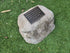 urn for ashes in a shape of a rock