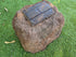 urn for ashes in a shape of a rock